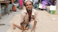 জন্ম থেকেই প্রতিবন্ধী মহরম আলী জানালেন, আল্লাহর রহমতে অনেক সুখে আছি